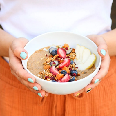 Amaretti Porridge-Girl Holding Box